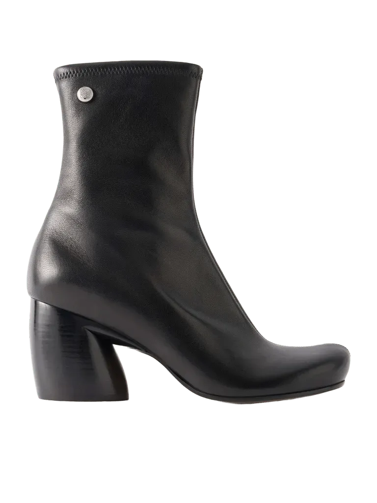 Oval leather ankle boots