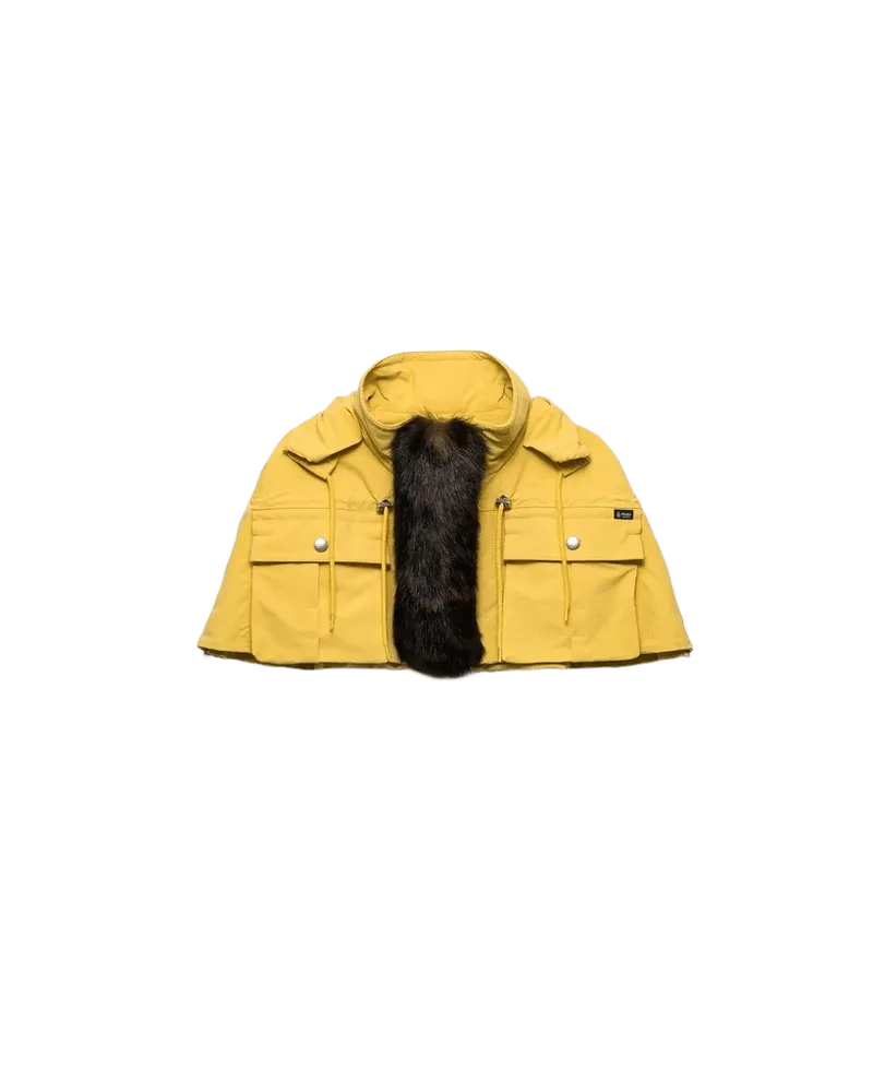 Technical fabric capelet with shearling trim