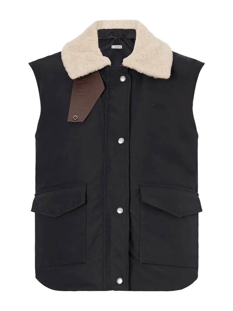Logo-debossed shearling and leather-trimmed cotton-blend canvas vest
